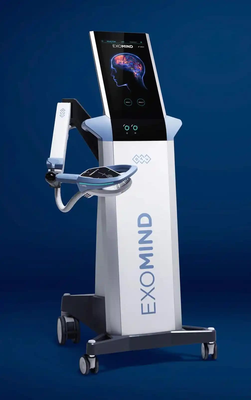 The ExoMind treatment system: a mobile console with a touchscreen and an articulated arm holding the treatment coil.